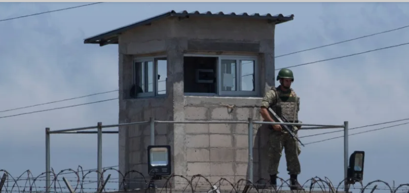 A soldier stands guard outside Campón Prison in Montevideo on November 21, 2019.  Published in "Resistance Stories" The largest prison break in history: Montevideo, 1971